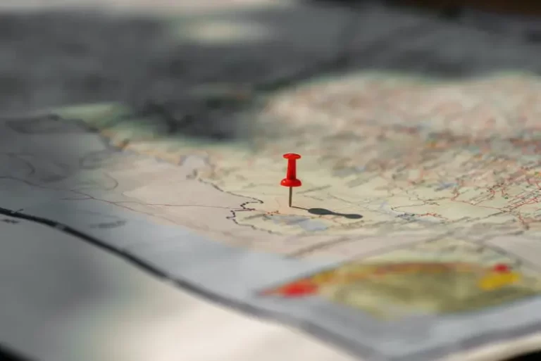 Explain what dropping a pin in Google Maps is and why it's useful